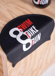 Gourde noire en plastique biodégradable + Bonnet de bain Swim Bike Run